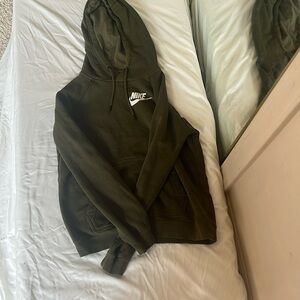 Slightly worn green Nike hoodie! Super comfy for all times of the year.